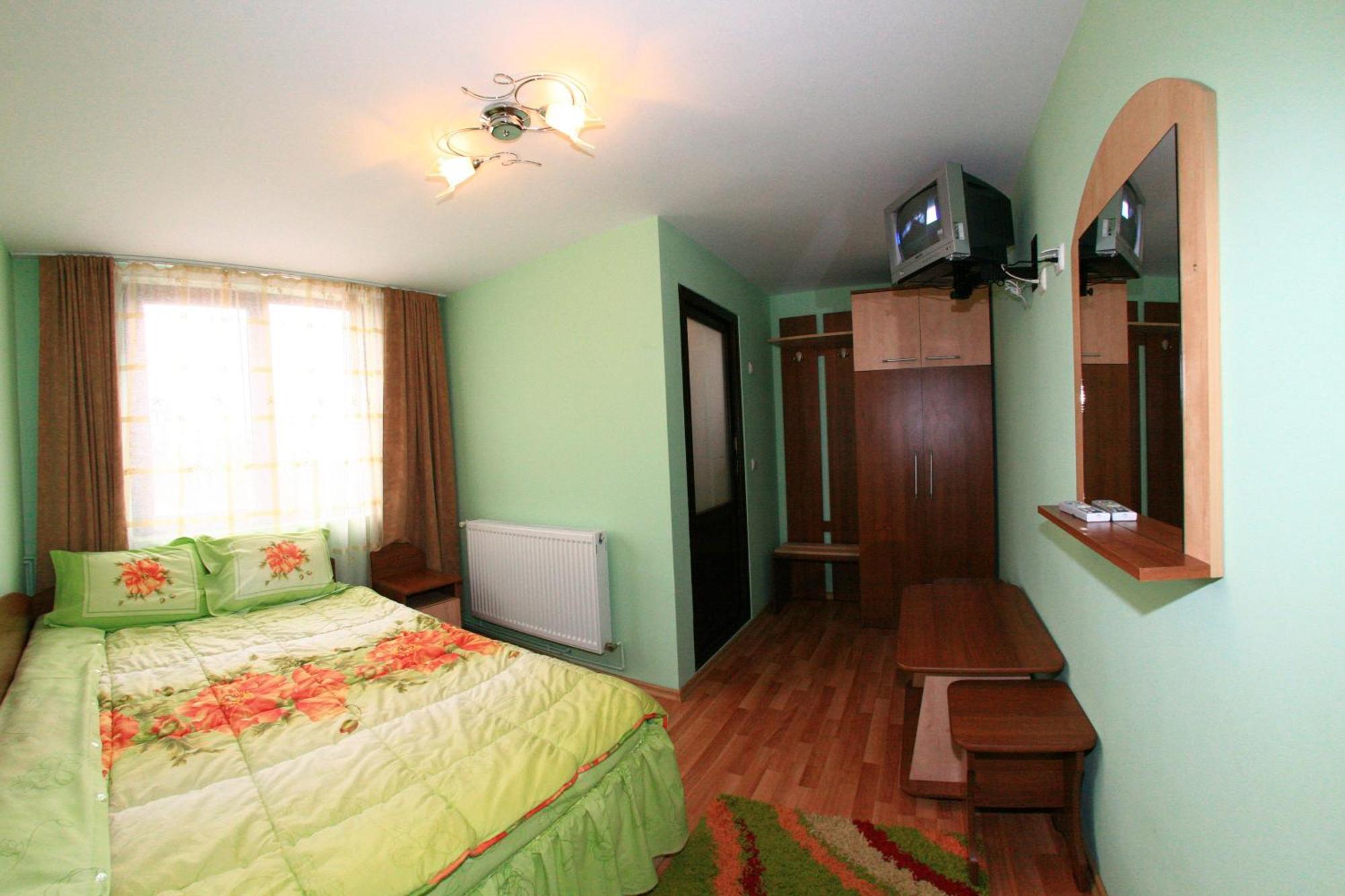 Pensiunea Valea Ursului クンプルング 部屋 写真